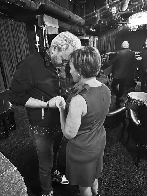 Chet Roberts and Angelique McKinney in prayer